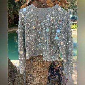 Reflective and flattering soft top.